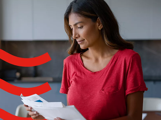 A woman reading a letter